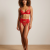 Generated with Kive.ai - fais porter cet article en une femme metisse debout Ensemble lingerie complet trois pièces 13